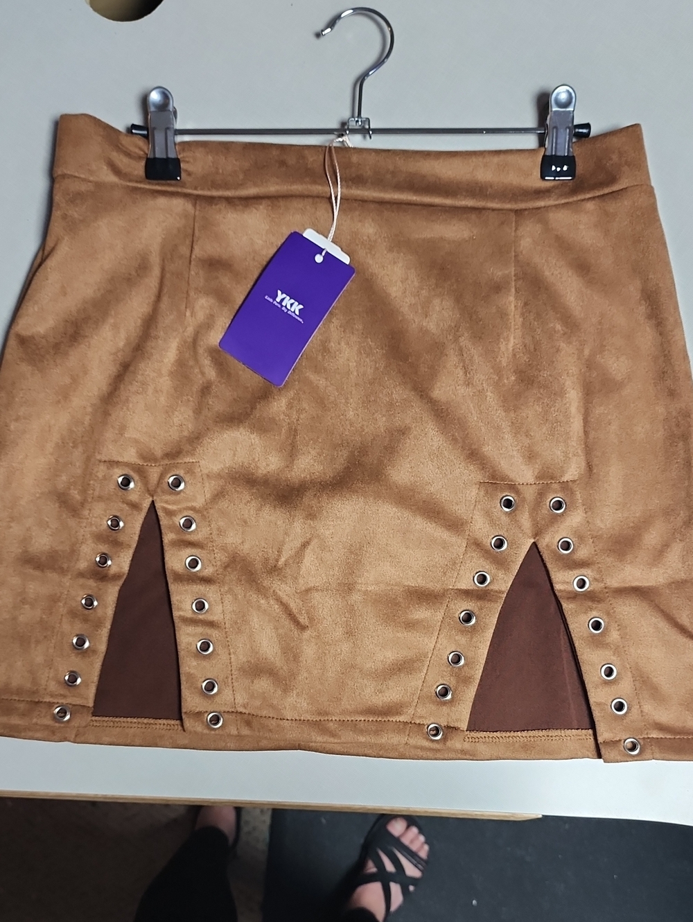 Women's sexy mini skirt. Comes with fishnet stockings.